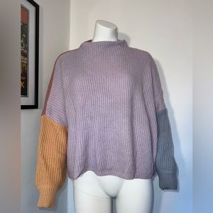 Purple, peach, blue, pink color block knit sweater. Size L